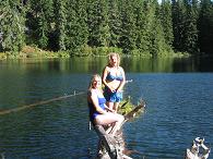 photo of Denise & Kim on a log at Pika Fir Lake
